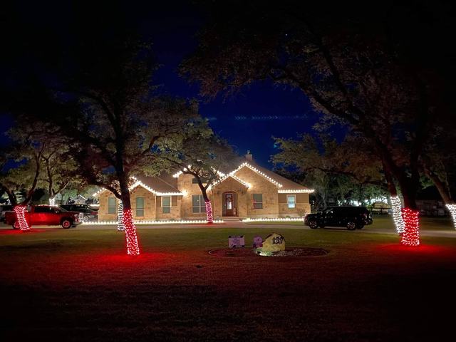 Red tree wraps and warm white rooflines