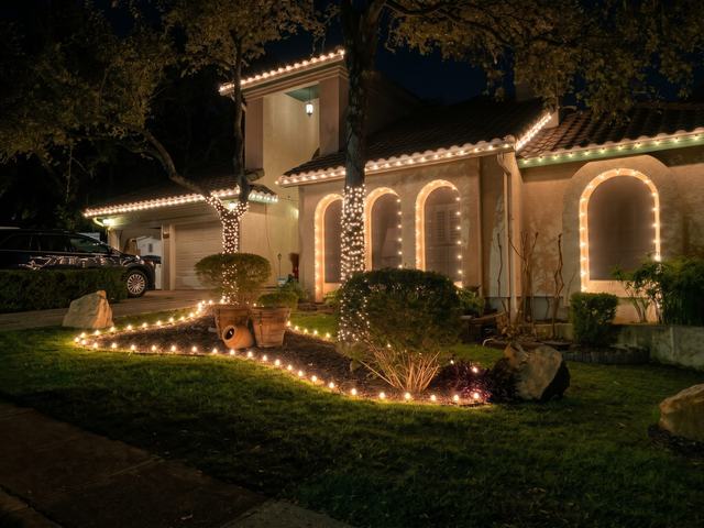 Warm white arches and landscape lighting
